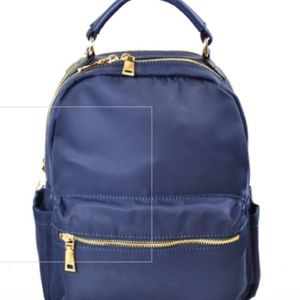 Nylon backpack with side pockets.